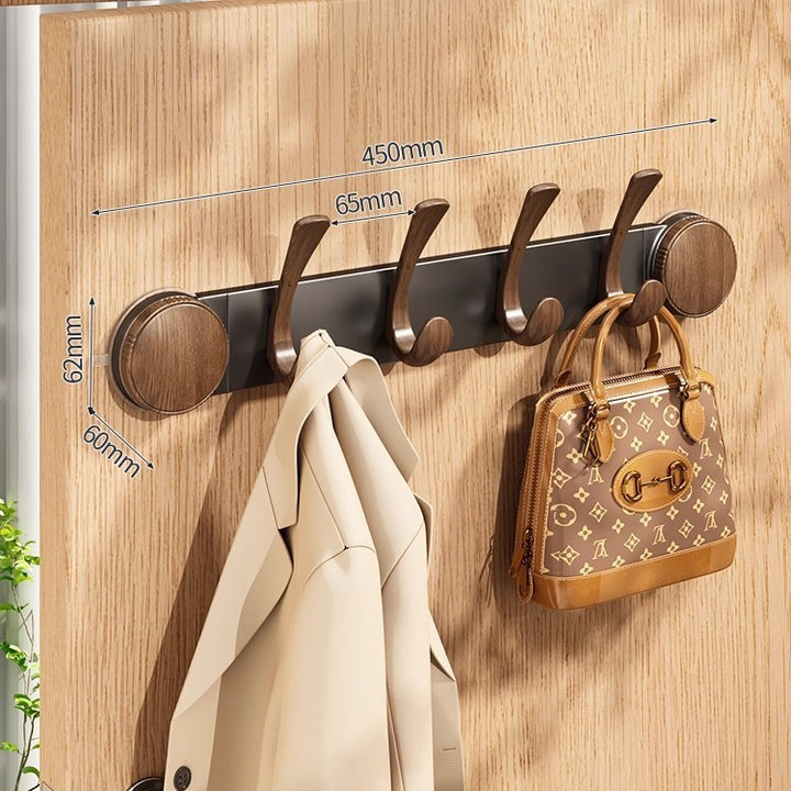 Door-mounted coat and accessory holder