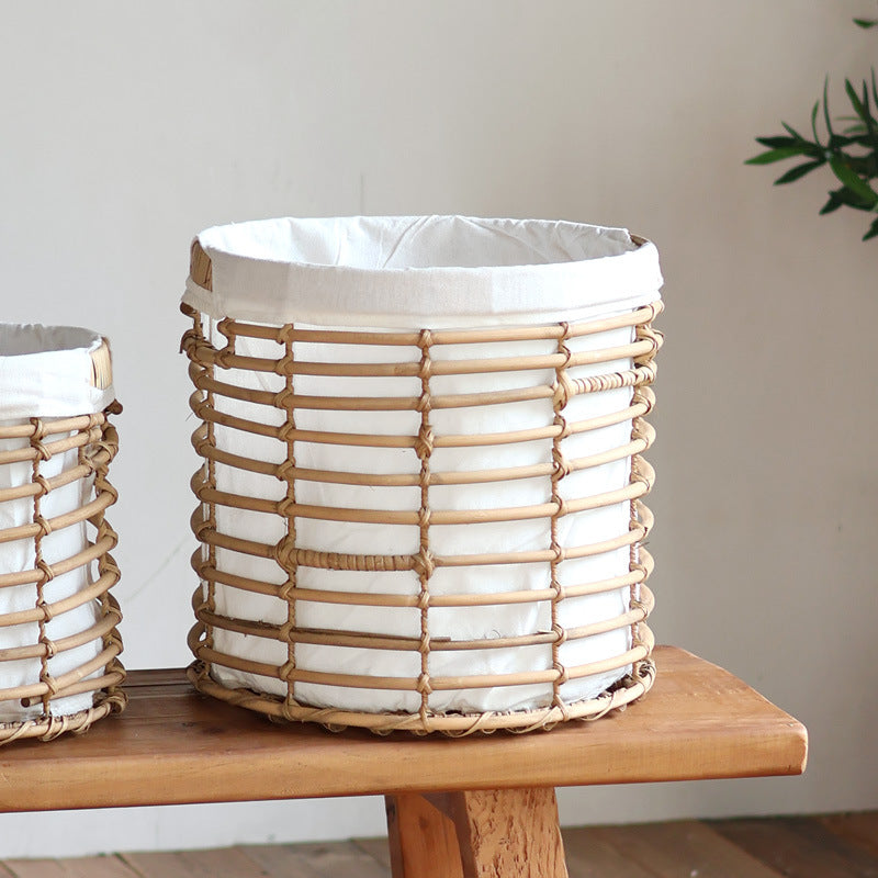 Decorative storage basket with fabric lining