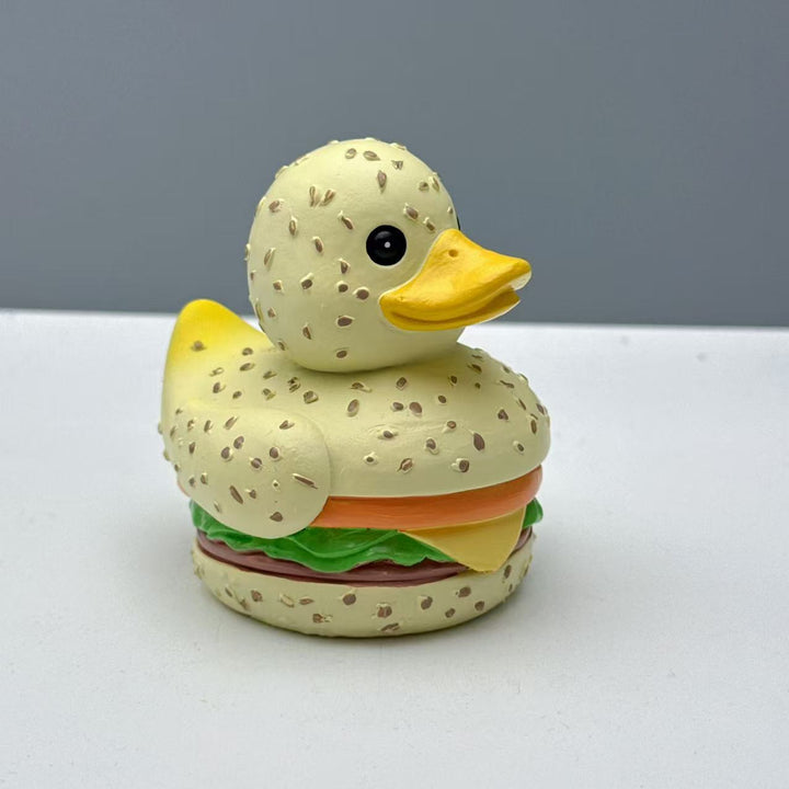 Funny rubber duck in hamburger design