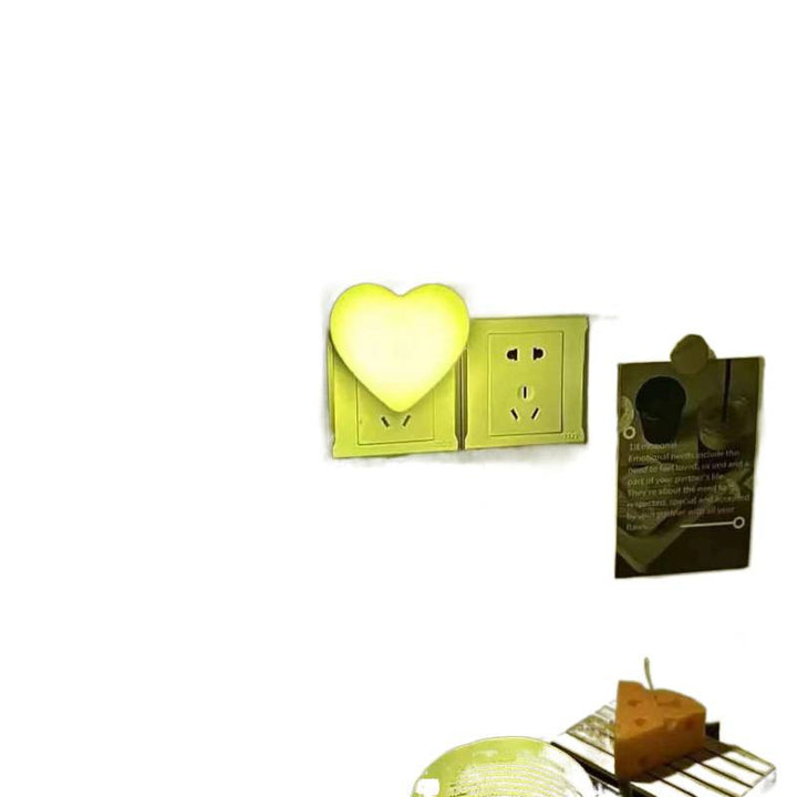 Heart-shaped plug-in ambient night light with soft LED lighting