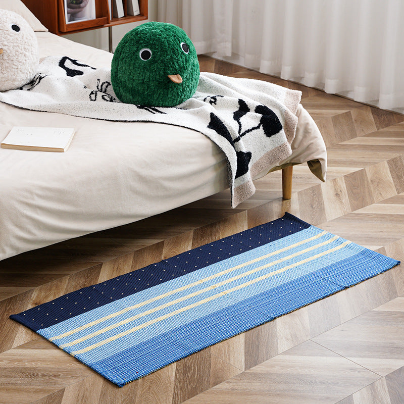 Flat-woven runner rug with check pattern and decorative border stripe