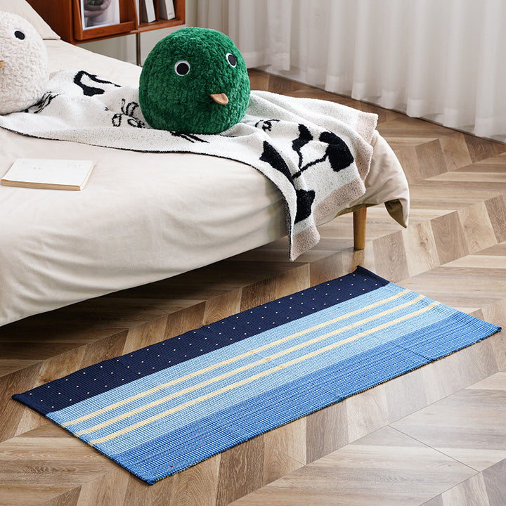 Flat-woven runner rug with check pattern and decorative border stripe