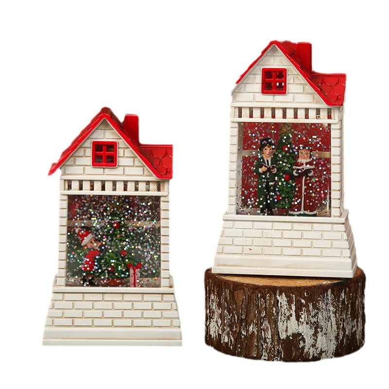 Illuminated Christmas village with moving figures