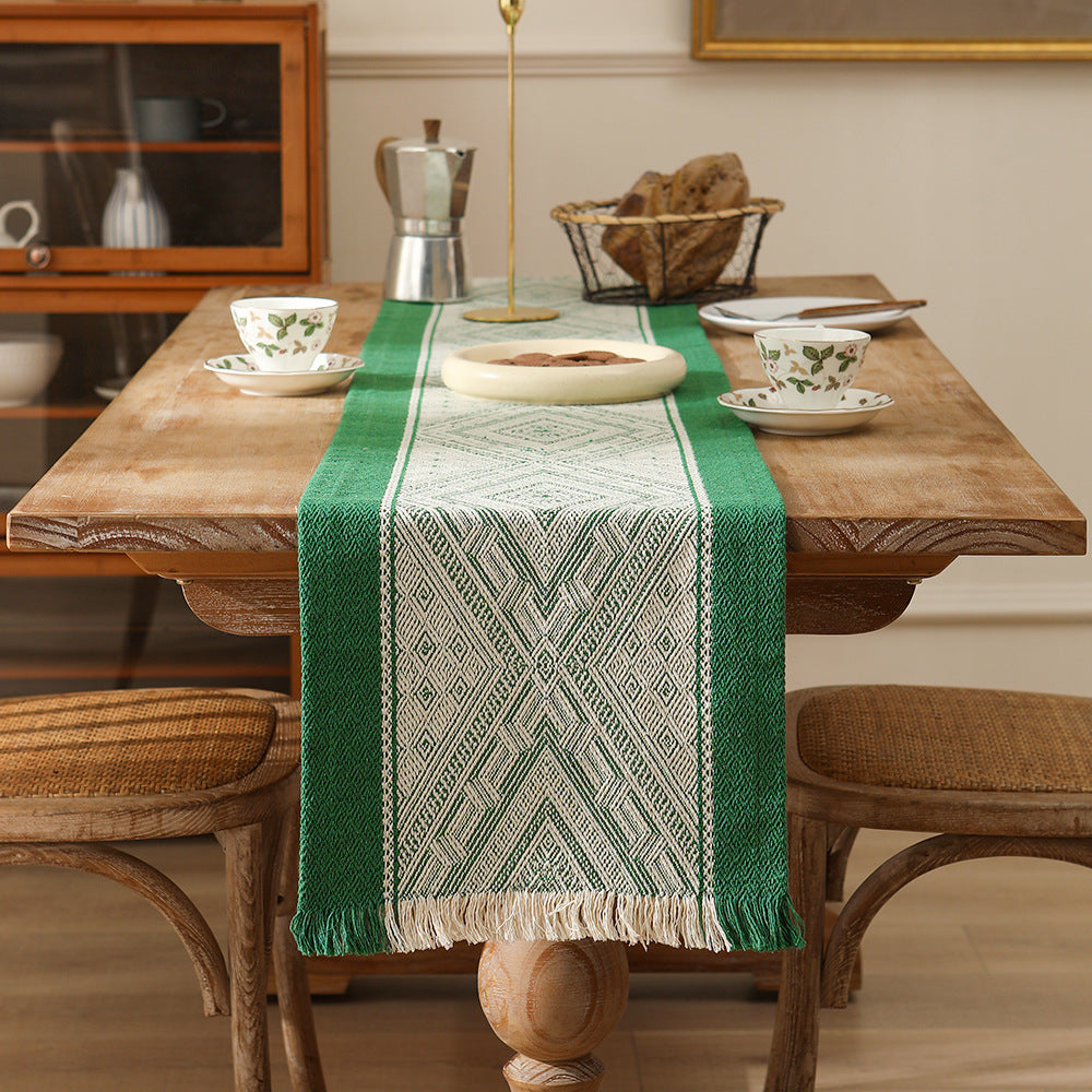 Handwoven table and console runner made of cotton blend fabric with geometric diamond pattern and fringes