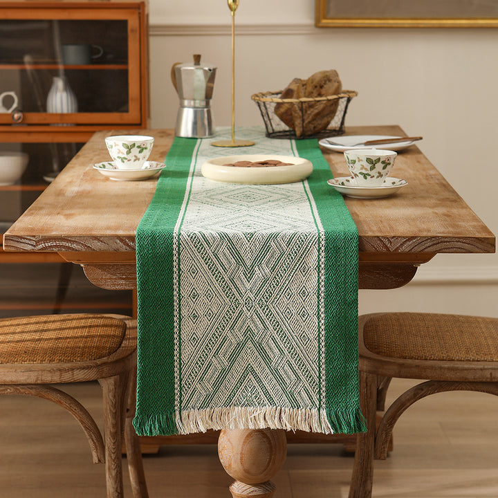 Handwoven table and console runner made of cotton blend fabric with geometric diamond pattern and fringes