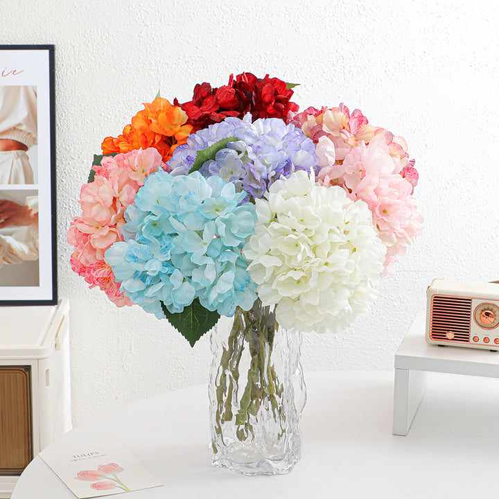Artificial flower branch with realistic flowers