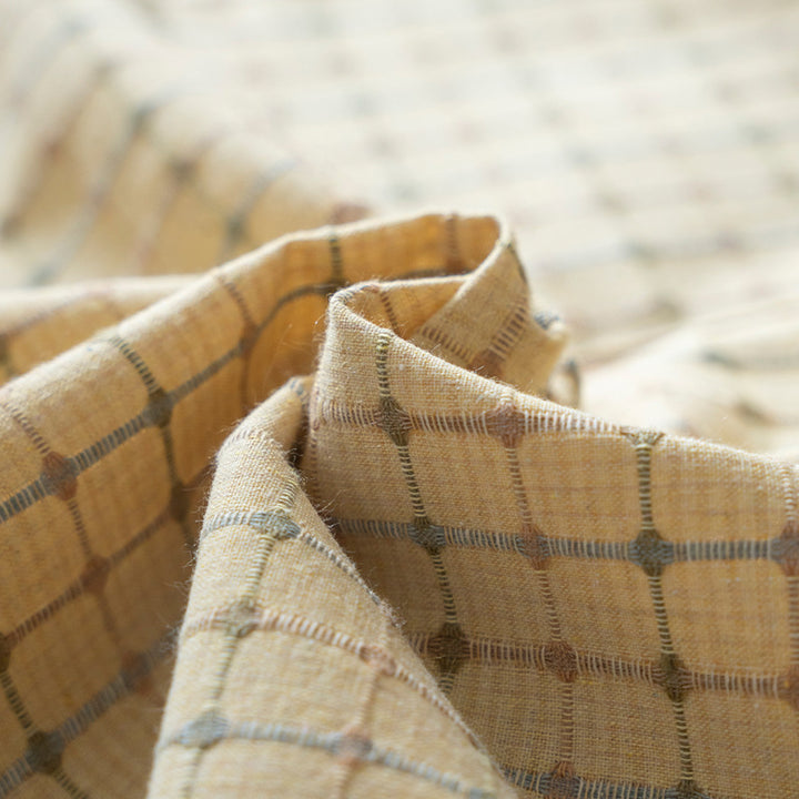 Cotton apron with checkered linen look, adjustable neck strap and large front pocket