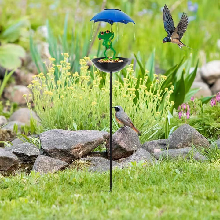 Decorative garden birdhouse stake with protective umbrella and playful frog decoration