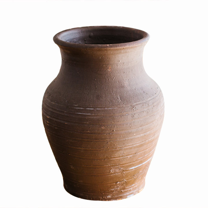 Rustic ceramic pot with handmade design