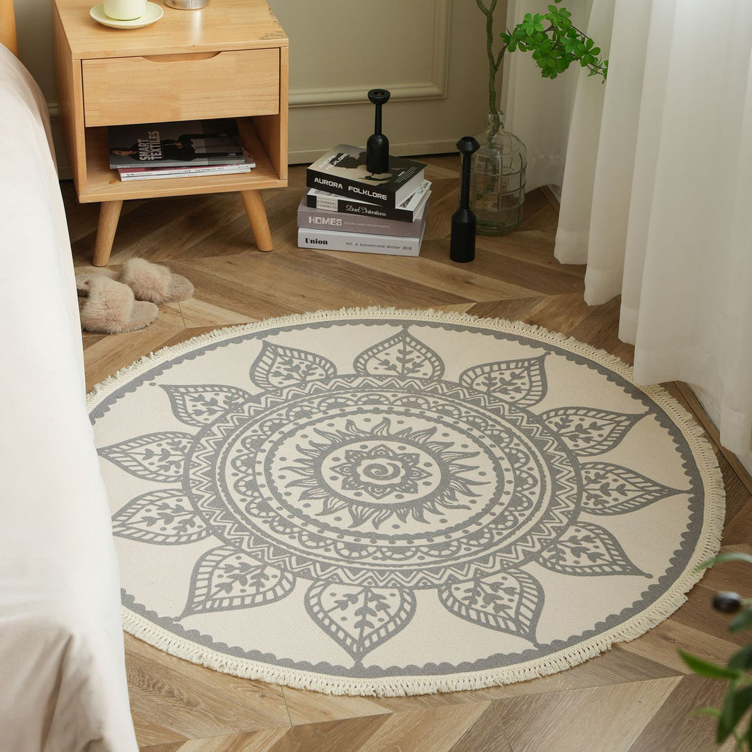 Round woven rug with mandala motif, flat cotton-jute mix and fringes