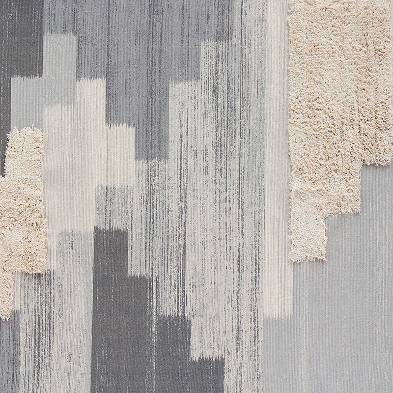 Modern structured living rug with partial shag application and abstract stripe pattern
