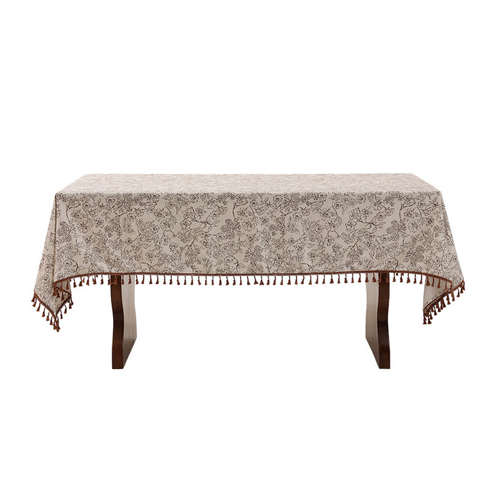 Tablecloth made of cotton blend fabric with floral jacquard look and tassel trim