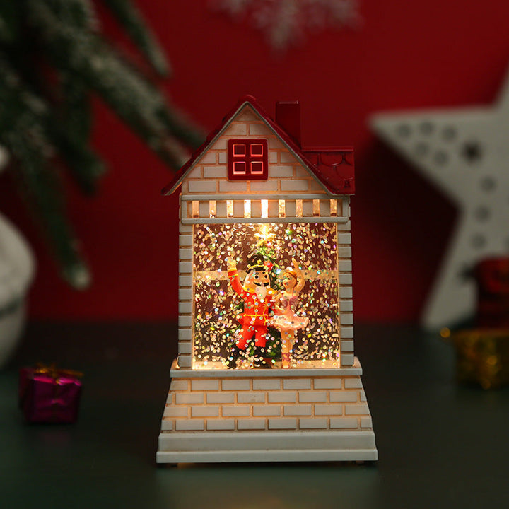 Illuminated Christmas village with moving figures