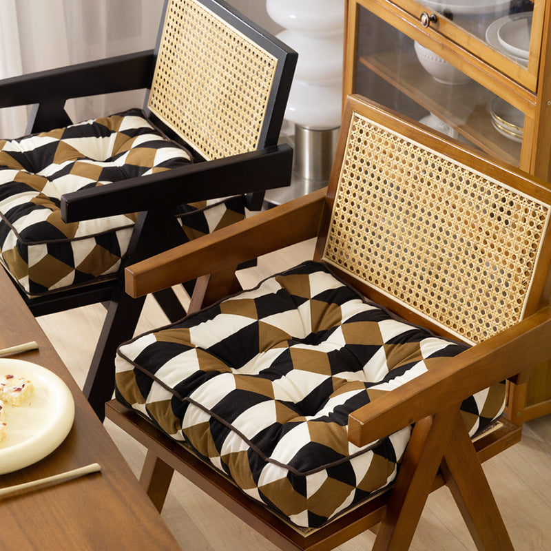 Padded chair cushion with ties and tufted seat