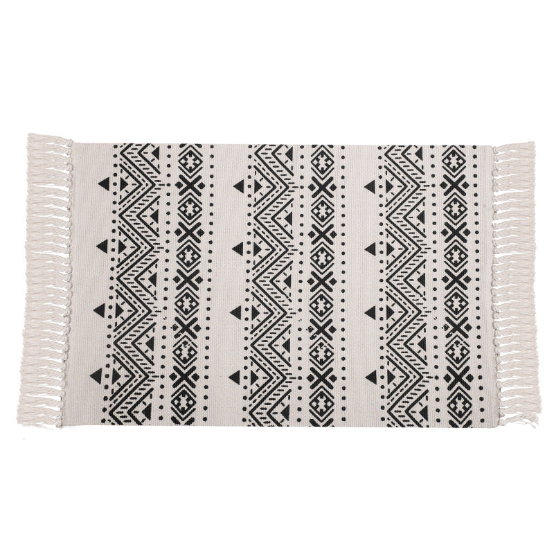Flat-woven cotton runner with Mediterranean tile jacquard and decorative fringes