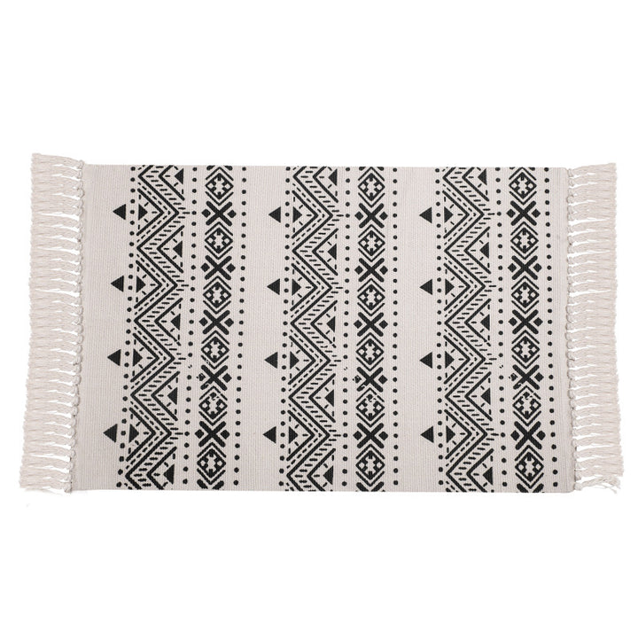 Flat-woven cotton runner with Mediterranean tile jacquard and decorative fringes