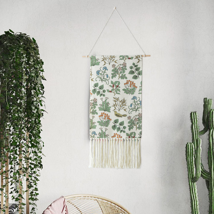 Woven wall hanging with floral jacquard structure and long fringes
