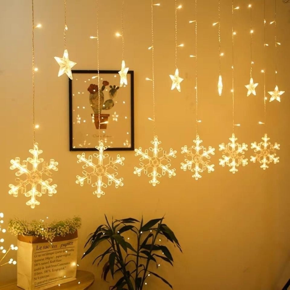 Hanging star and crescent moon LED curtain string lights for bedroom ambiance