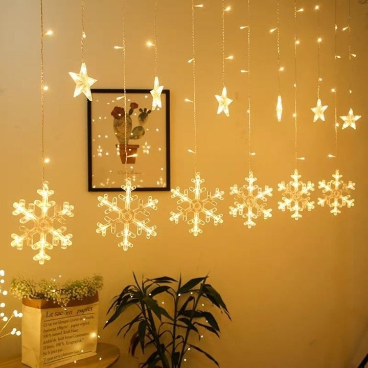 Hanging star and crescent moon LED curtain string lights for bedroom ambiance