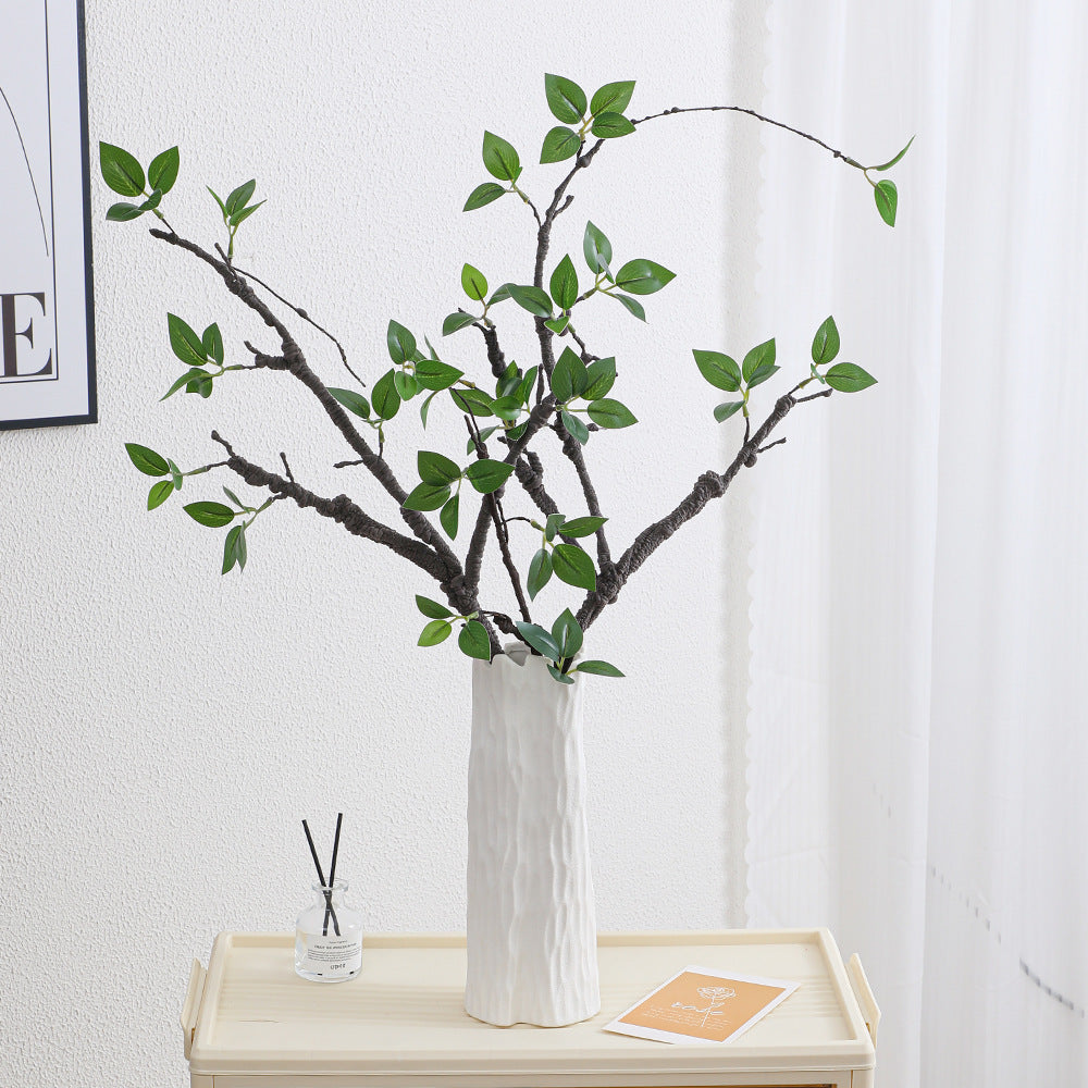 Decorative artificial tree branch with realistic leaves