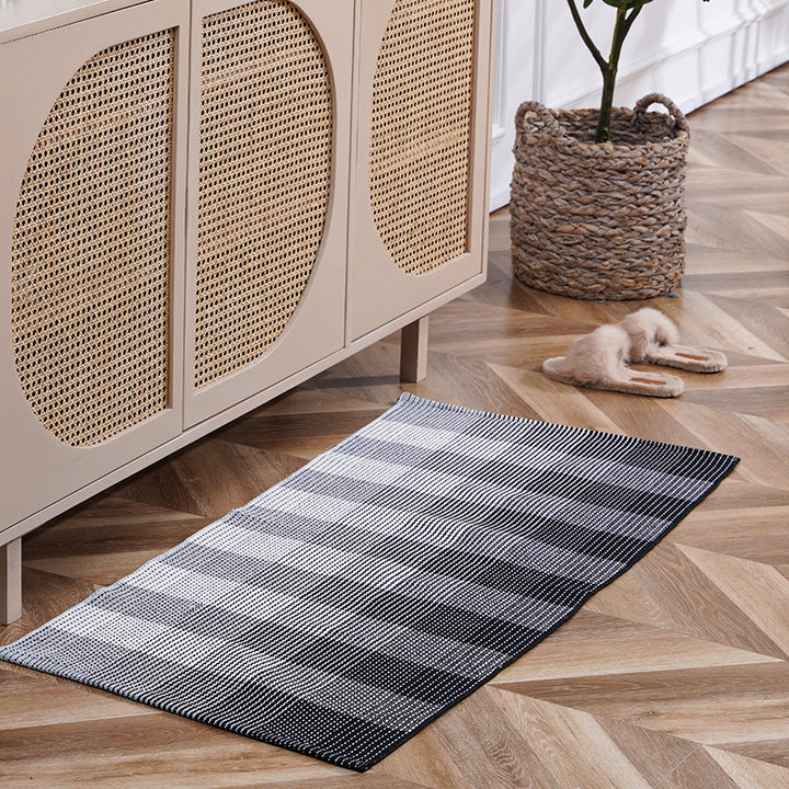 Flat-woven runner rug with check pattern and decorative border stripe