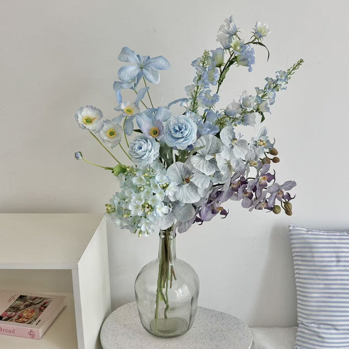 Luxurious artificial flower bouquet with blooming orchids