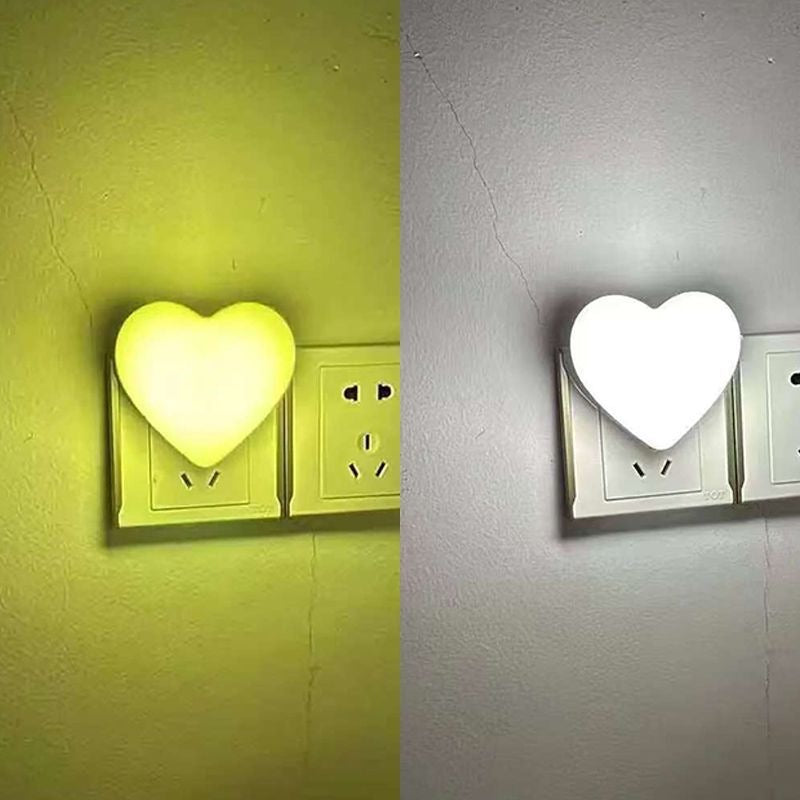 Heart-shaped plug-in ambient night light with soft LED lighting