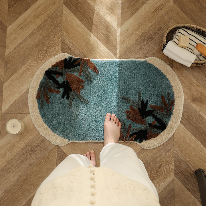 Tufted bath mat rug with botanical textured design
