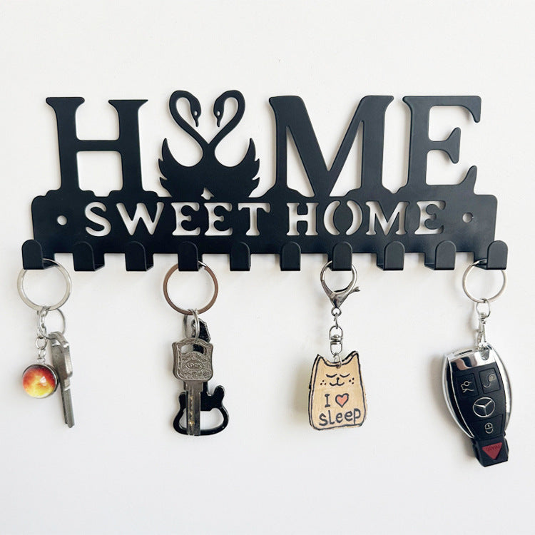 Metal key holder with cat design