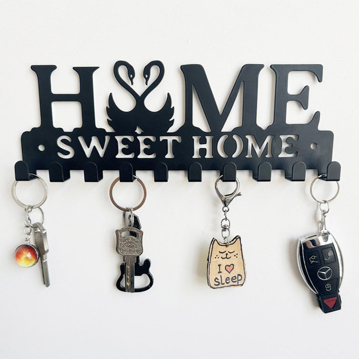 Metal key holder with cat design