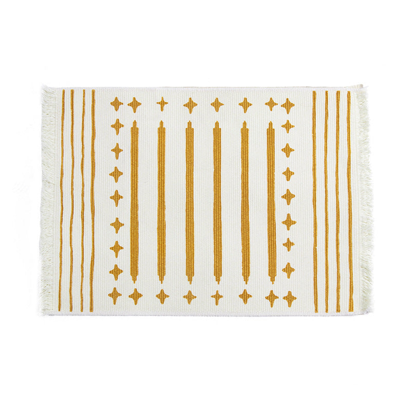 Woven placemat made of cotton blend with geometric diamond trim and fine texture