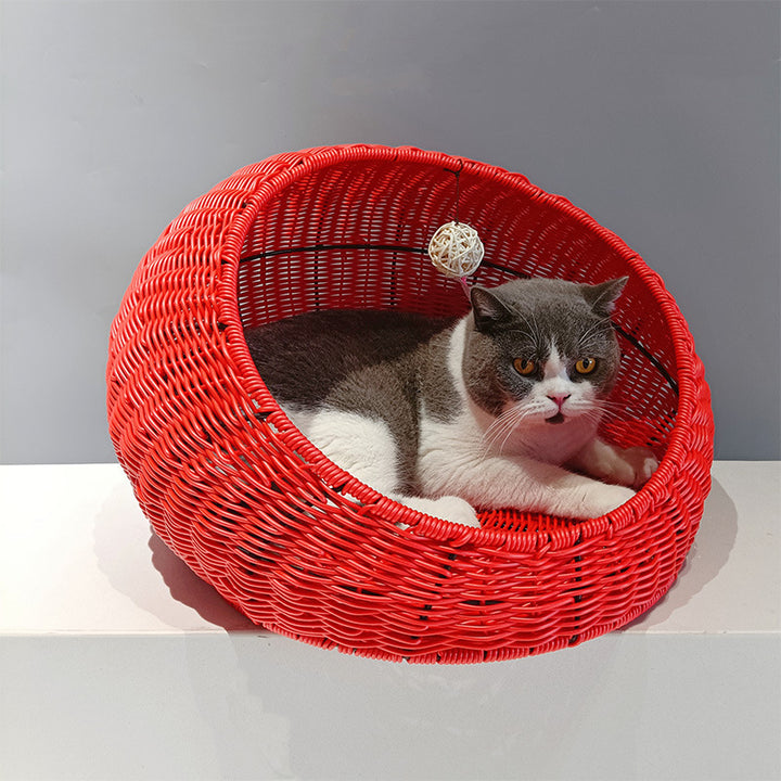 Cozy cat bed made of woven natural material