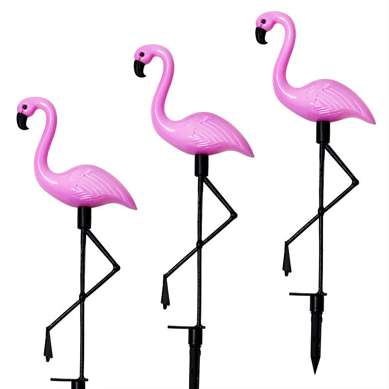 Decorative solar-powered flamingo garden stake with adjustable tray and spike attachment