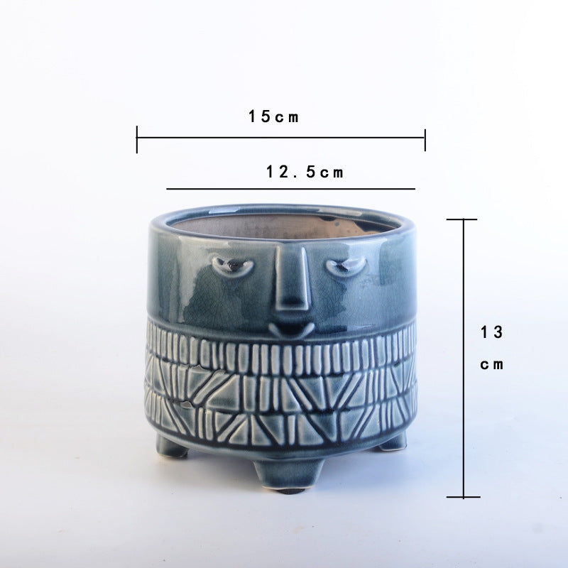 Decorative plant pot with facial features