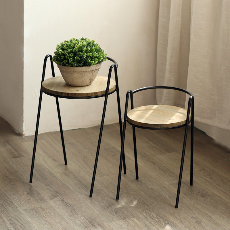 Modern stool with wooden seat and metal frame