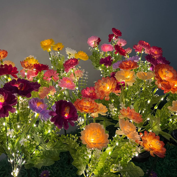Solar-powered decorative garden stele with lifelike ranunculus bouquet