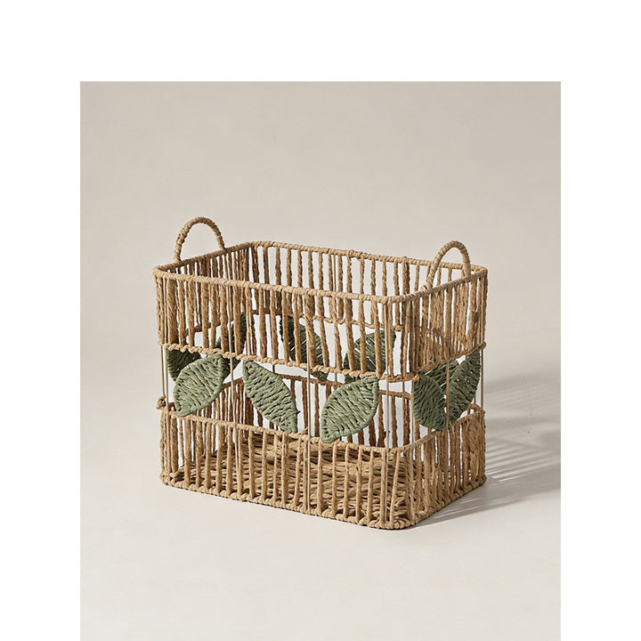 Handcrafted storage basket with leaf motif