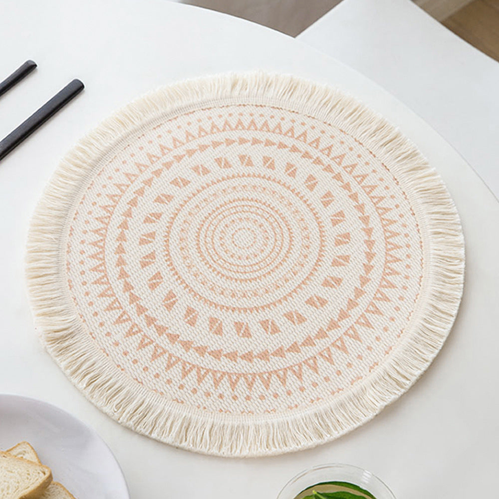Round woven placemat with fringes and mandala jacquard structure