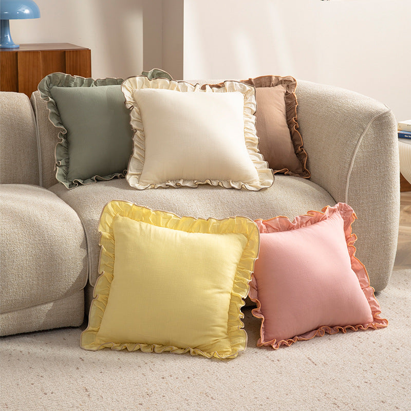 Square decorative pillow with ruffle and linen look