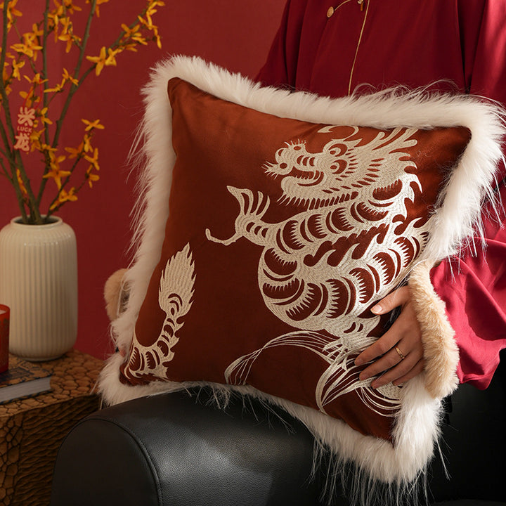 Square velvet decorative pillow with embroidered dragon motif and faux fur trim