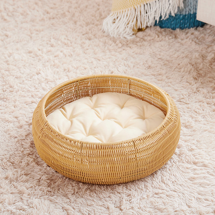 Cat bed with round rattan decoration