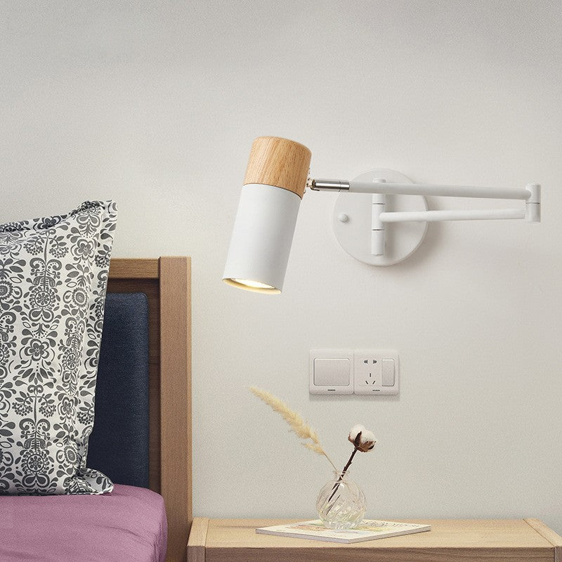 Adjustable swivel arm wall spotlight with wood accent