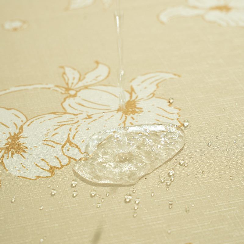 Round wipeable tablecloth with floral cut-out hem