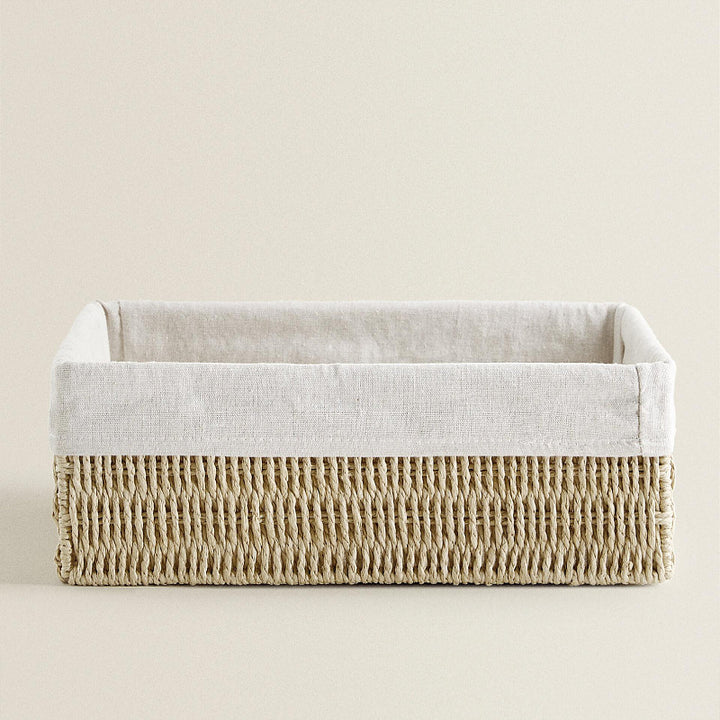 Natural storage basket with removable lining