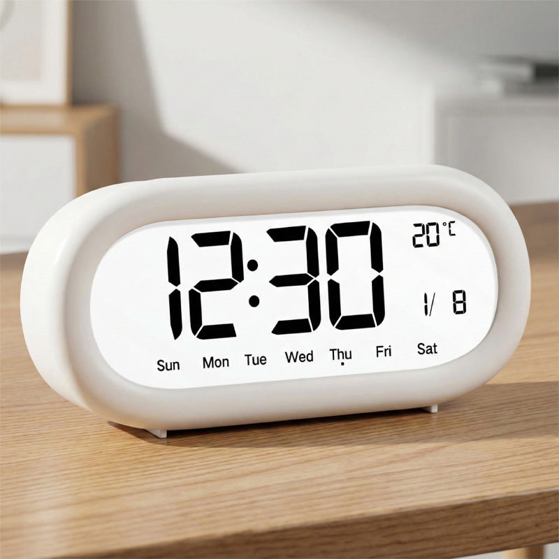 Digital alarm clock with temperature display