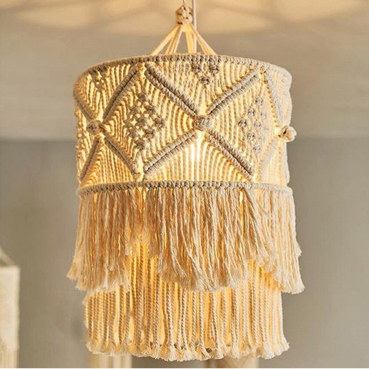 Macrame plant hanger with decorative fringes