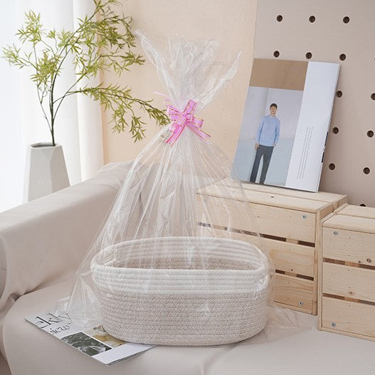 Natural storage basket with ribbons