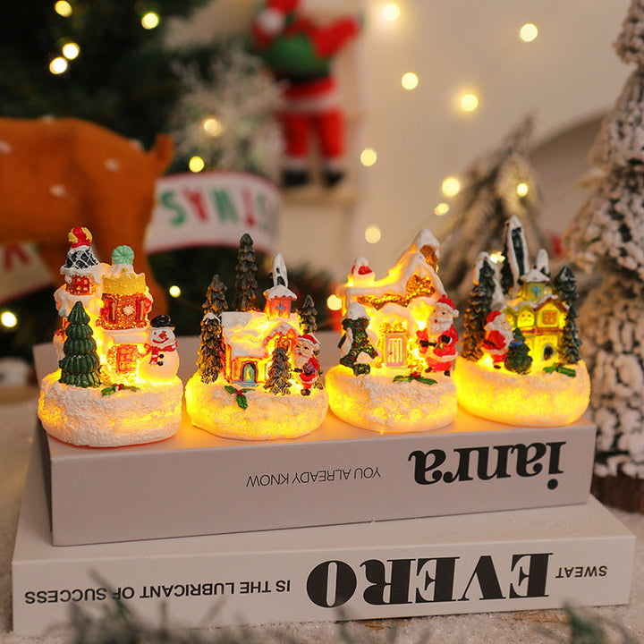Christmas miniature lighting with snow scenes