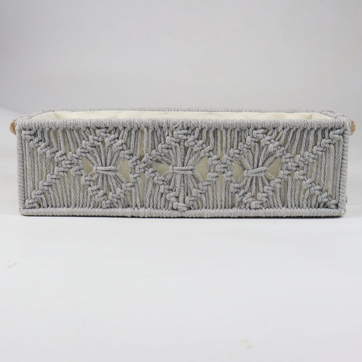 Storage basket with macrame pattern