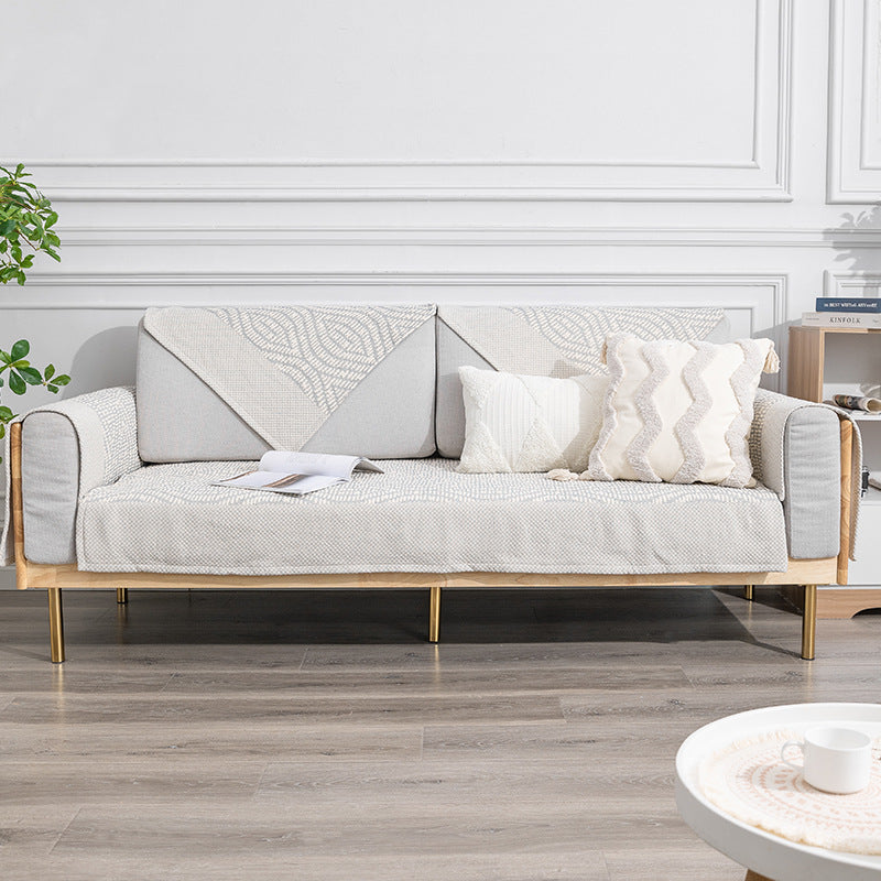 Quilted cover for sofa with armrest protectors and non-slip underside